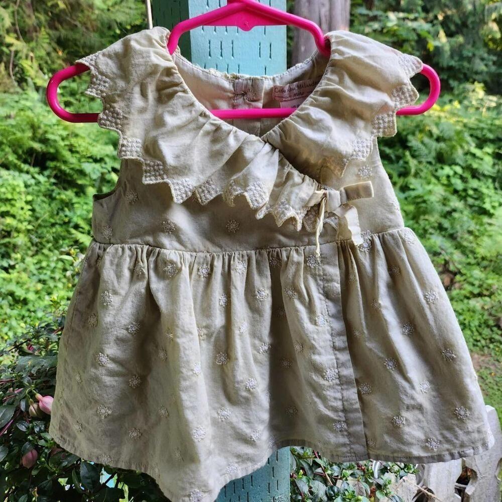 Adorable Baby Dress with Ruffled Collar and Bow Detail